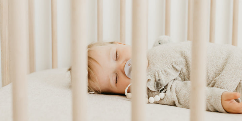 Baby sleeping in crib
