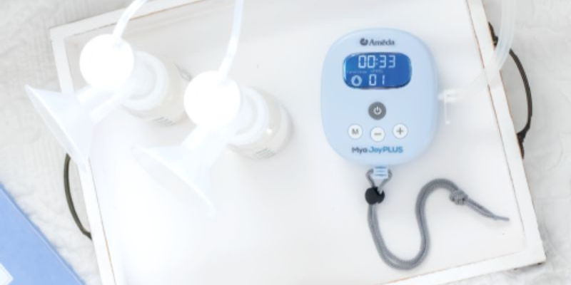 Ameda Mya PLUS breast pump on tray 