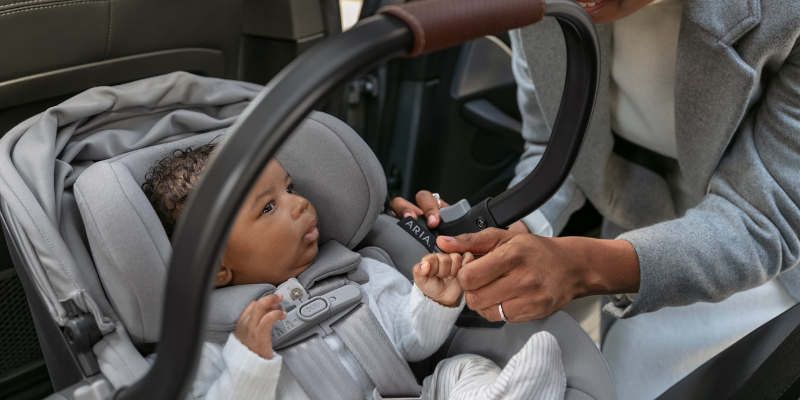 Baby Sitting in UPPAbaby Aria Infant Seat 