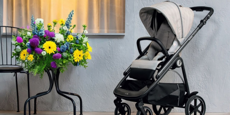 Peg Perego Veloce Stroller R Beside a Vase of Flowers
