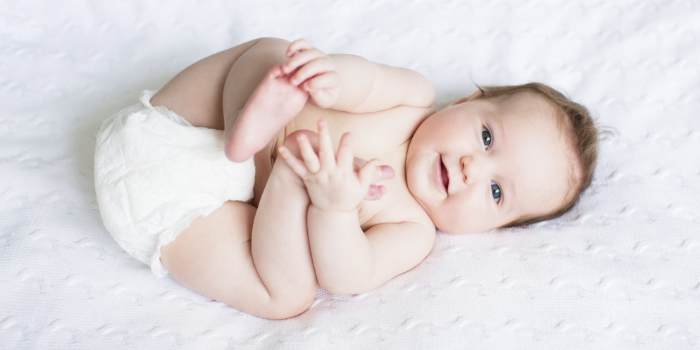 Happy Baby laying down
