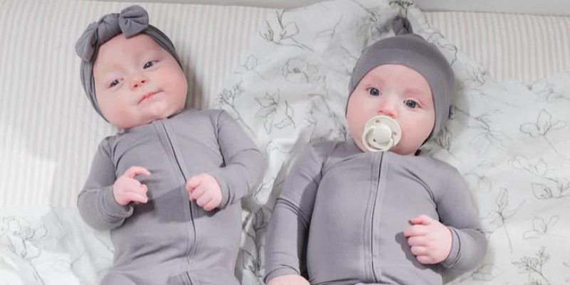 Two babies resting in Pip + Phee Bamboo Sleepers 