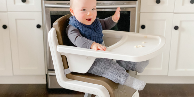 Baby sitting in a Nuna Zaaz high chair