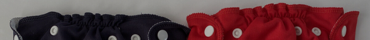 CLoseup of Navy and Red AppleCheek cloth diapers elastic bands