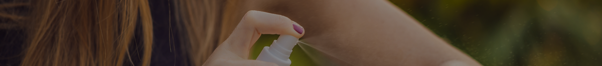 Women spraying herself with Care Plus insect repellent 