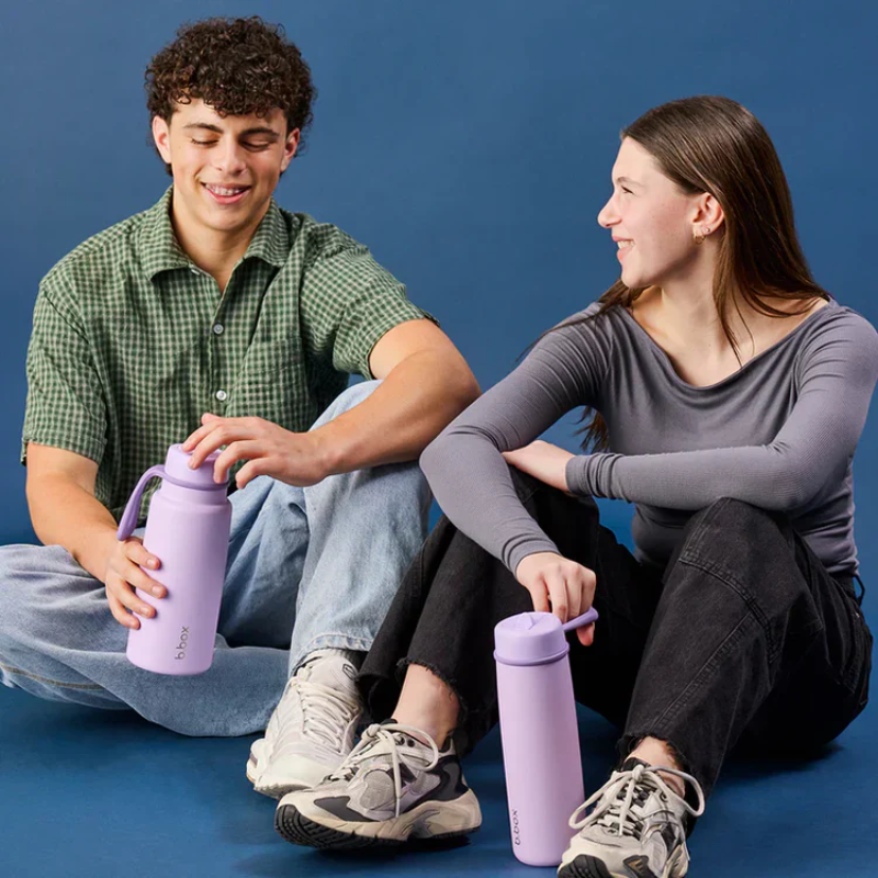Insulated water bottle with flip top