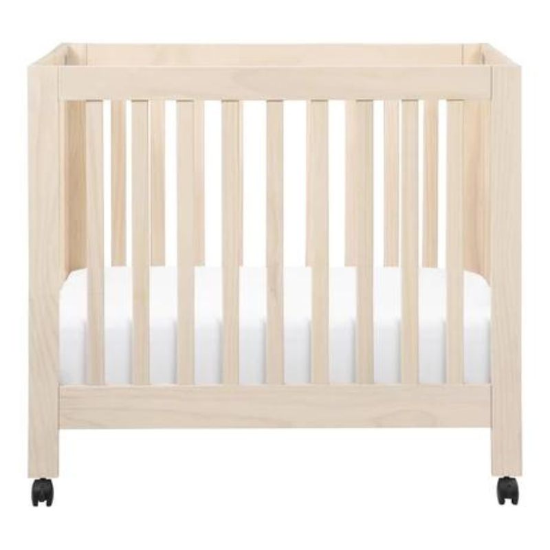 Origami Portable Mini Crib by Babyletto at $399! Shop now at Nestled by Snuggle Bugz for Cribs.